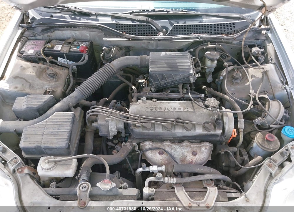 1999 HONDA CIVIC LX VIN: 2HGEJ6677XH573110