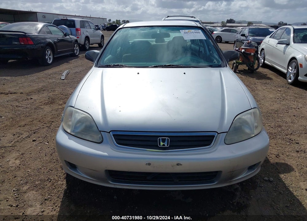 1999 HONDA CIVIC LX VIN: 2HGEJ6677XH573110