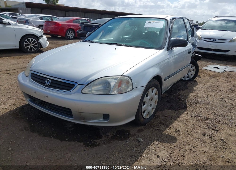 1999 HONDA CIVIC LX VIN: 2HGEJ6677XH573110