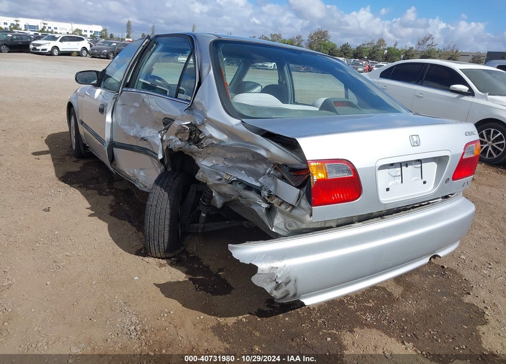 1999 HONDA CIVIC LX VIN: 2HGEJ6677XH573110