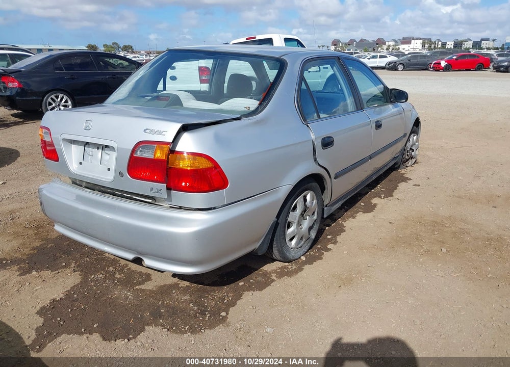 1999 HONDA CIVIC LX VIN: 2HGEJ6677XH573110