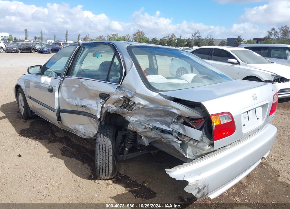 1999 HONDA CIVIC LX VIN: 2HGEJ6677XH573110