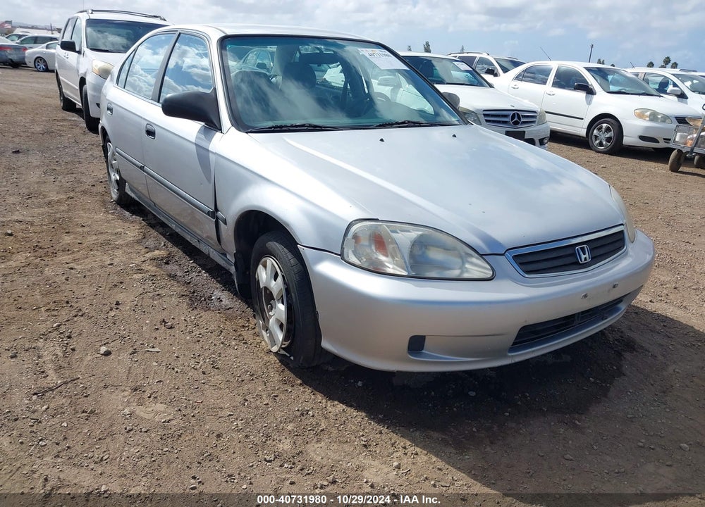 1999 HONDA CIVIC LX VIN: 2HGEJ6677XH573110