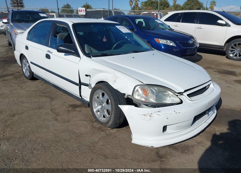 1999 HONDA CIVIC LX VIN: 2HGEJ6577XH543266