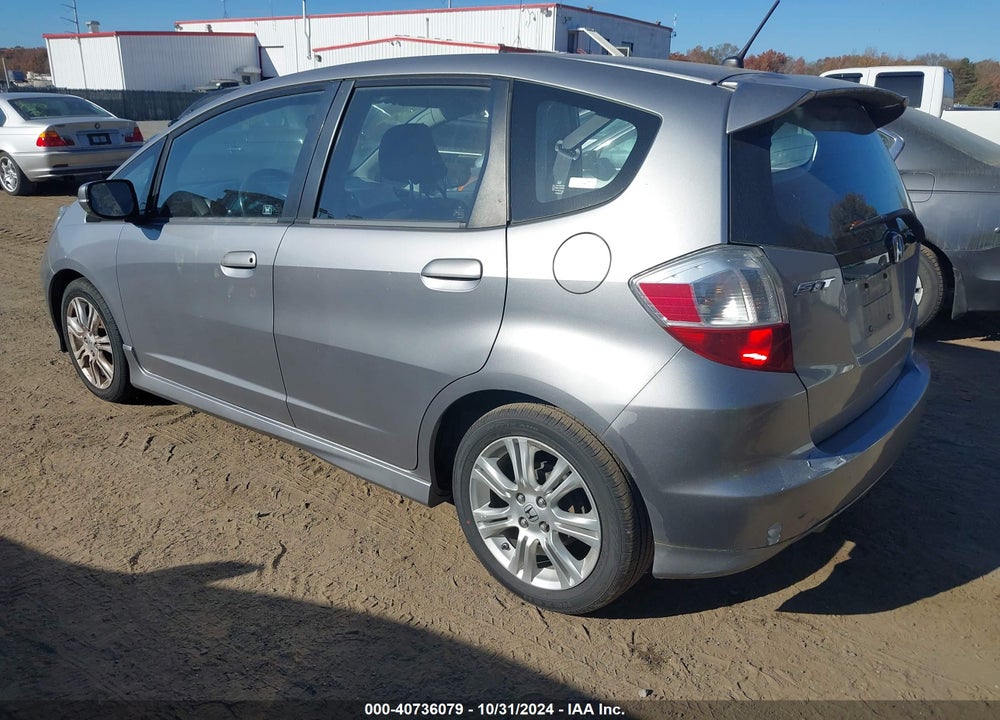 2009 HONDA FIT SPORT VIN: JHMGE88459S001943