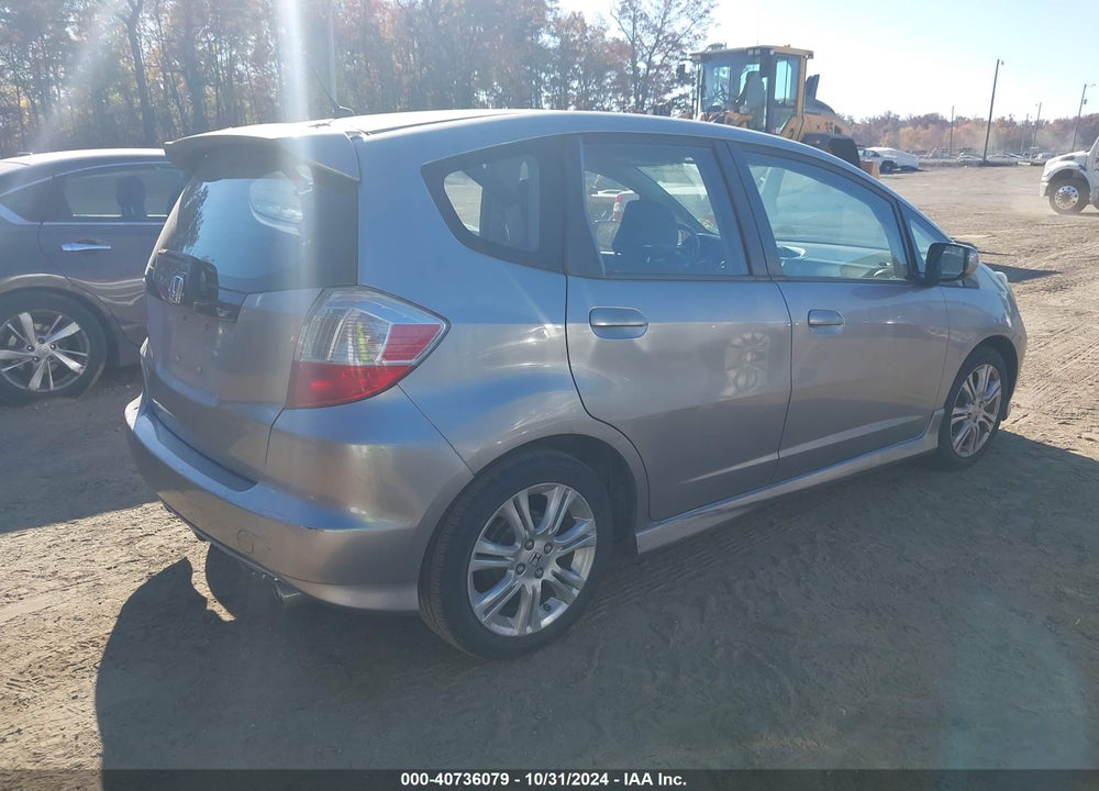 2009 HONDA FIT SPORT VIN: JHMGE88459S001943