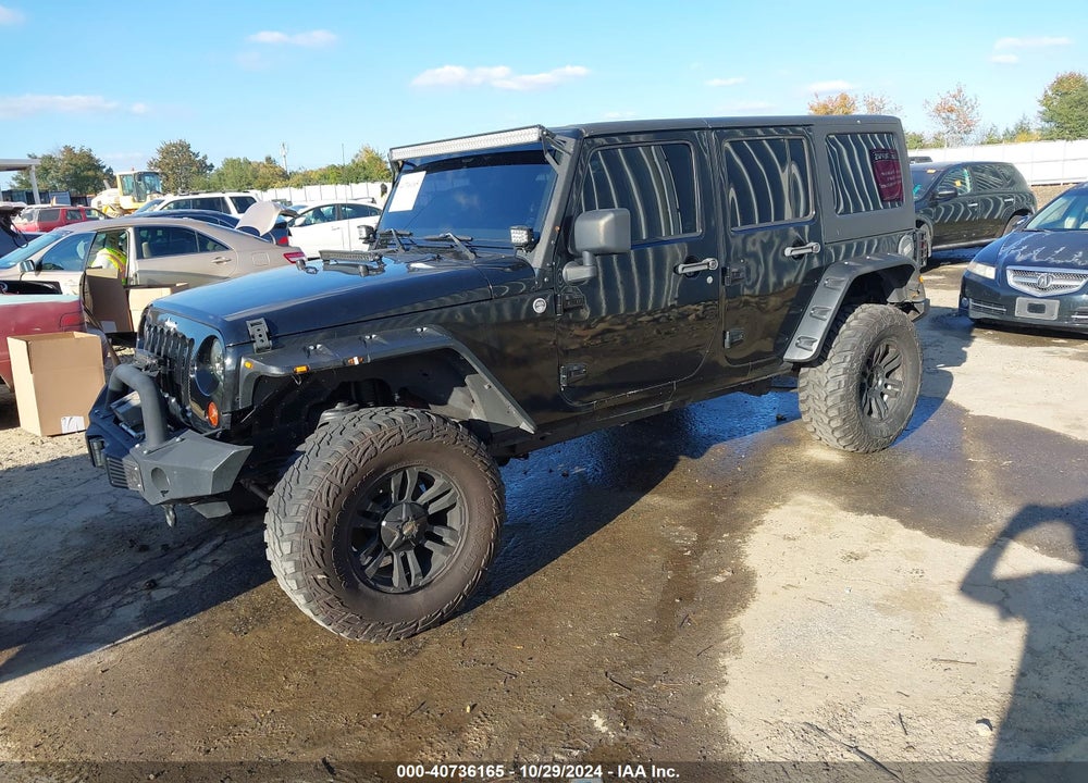 2012 JEEP WRANGLER UNLIMITED SPORT VIN: 1C4BJWDGXCL132640