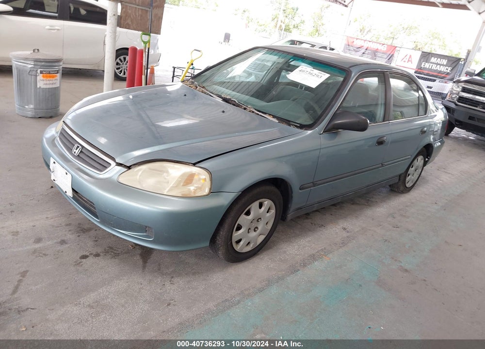 1999 HONDA CIVIC LX VIN: 1HGEJ6675XL005473