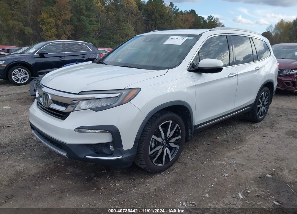 2020 HONDA PILOT 2WD TOURING 7 PASSENGER VIN: 5FNYF5H63LB001074