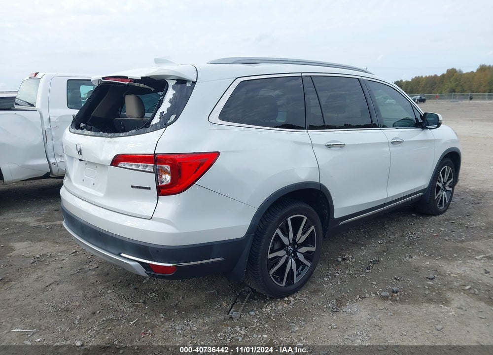 2020 HONDA PILOT 2WD TOURING 7 PASSENGER VIN: 5FNYF5H63LB001074