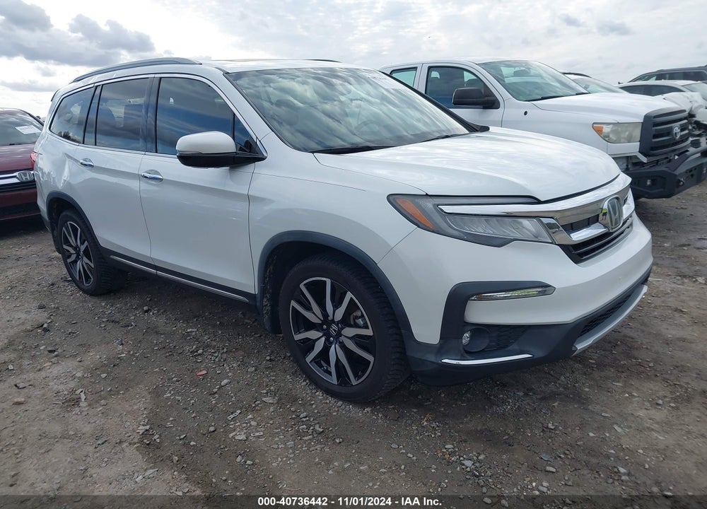 2020 HONDA PILOT 2WD TOURING 7 PASSENGER VIN: 5FNYF5H63LB001074