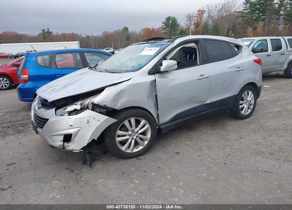 2012 HYUNDAI TUCSON LIMITED VIN: KM8JUCAC7CU434167