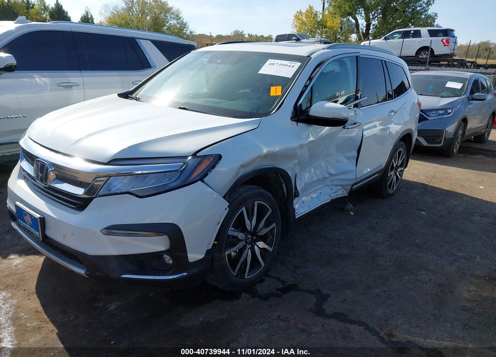 2022 HONDA PILOT 2WD TOURING 7 PASSENGER VIN: 5FNYF5H62NB011355