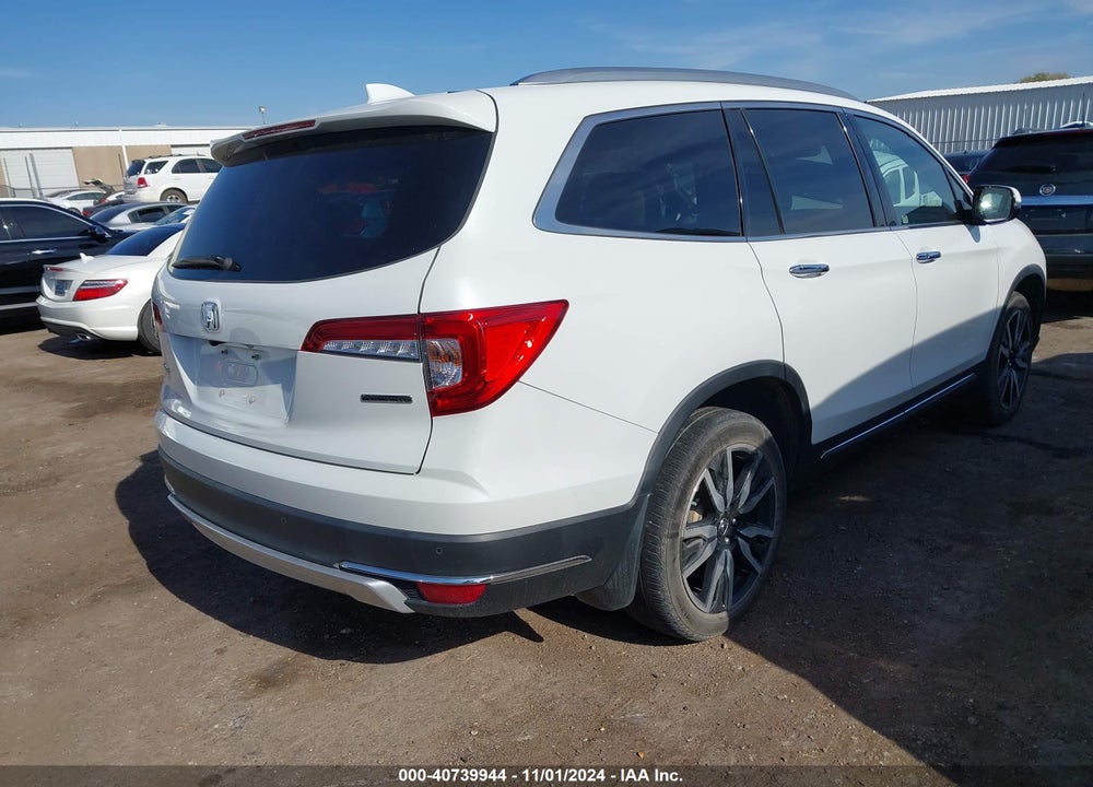 2022 HONDA PILOT 2WD TOURING 7 PASSENGER VIN: 5FNYF5H62NB011355