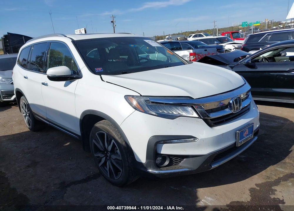 2022 HONDA PILOT 2WD TOURING 7 PASSENGER VIN: 5FNYF5H62NB011355