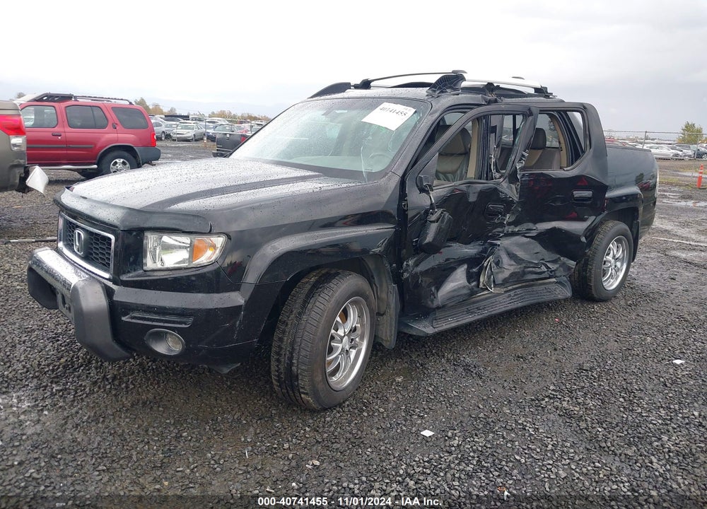 2006 HONDA RIDGELINE RTL VIN: 2HJYK16526H500229