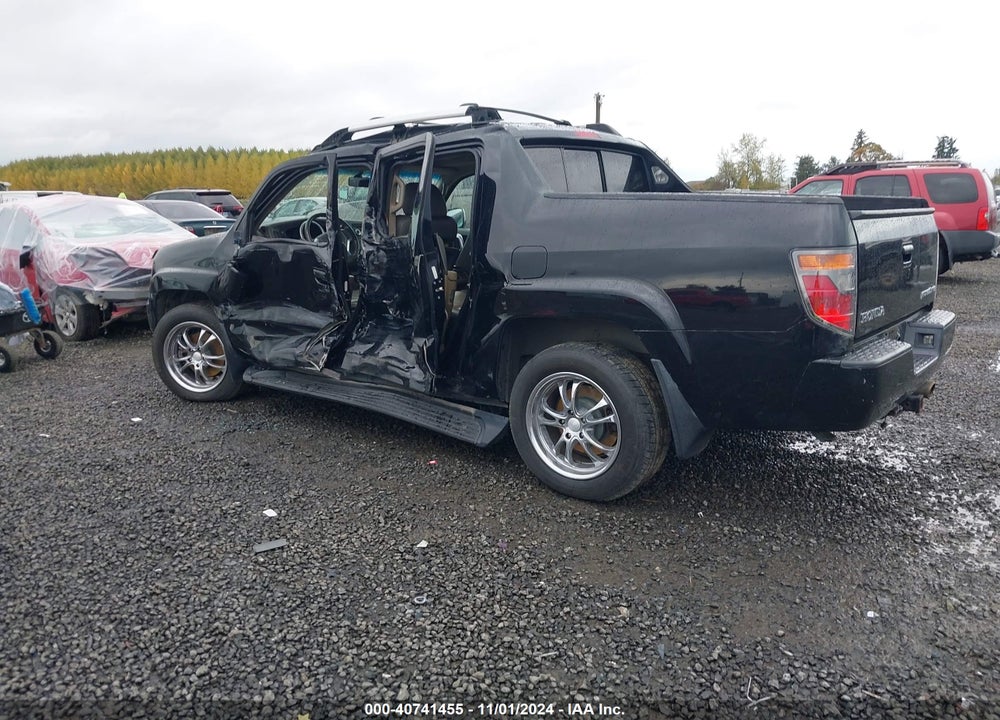 2006 HONDA RIDGELINE RTL VIN: 2HJYK16526H500229