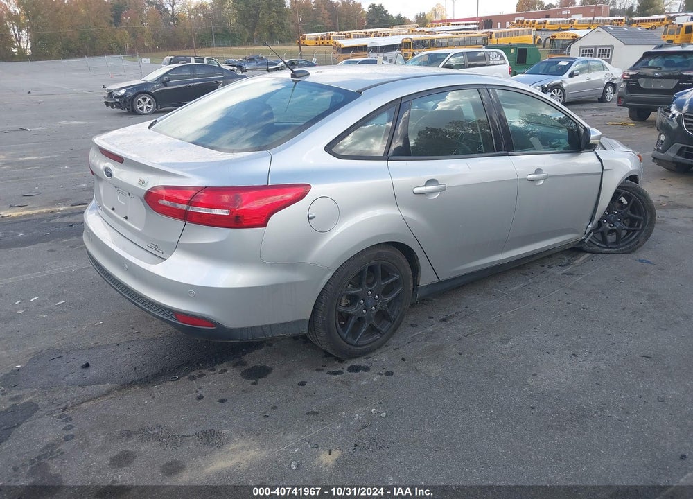 2016 FORD FOCUS SE VIN: 1FADP3F24GL295254