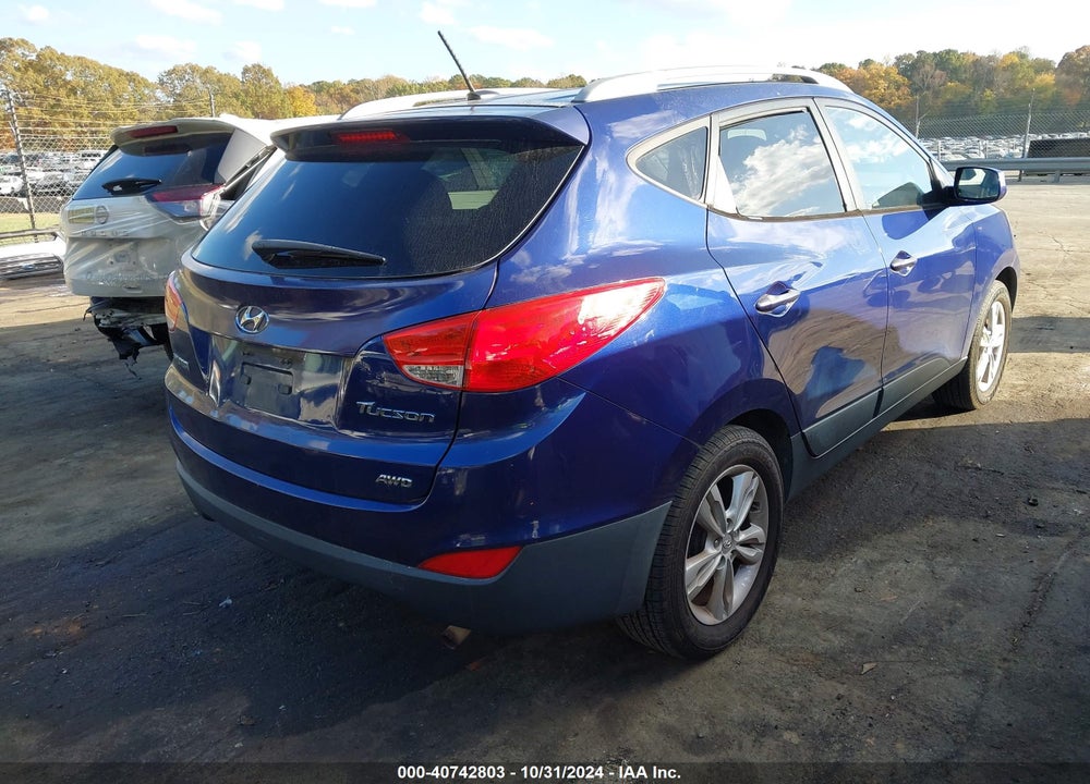 2010 HYUNDAI TUCSON GLS/LIMITED VIN: KM8JUCAC8AU033353