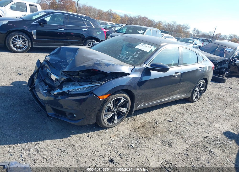 2016 HONDA CIVIC TOURING VIN: 19XFC1F91GE214185