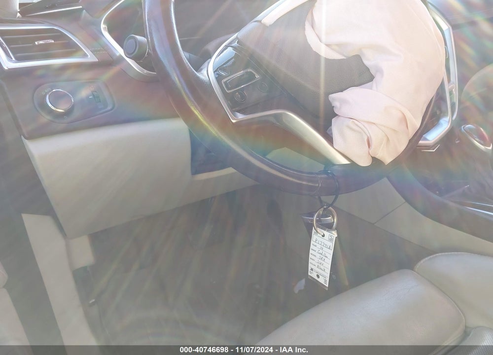 2014 CADILLAC SRX LUXURY COLLECTION VIN: 3GYFNBE36ES687702