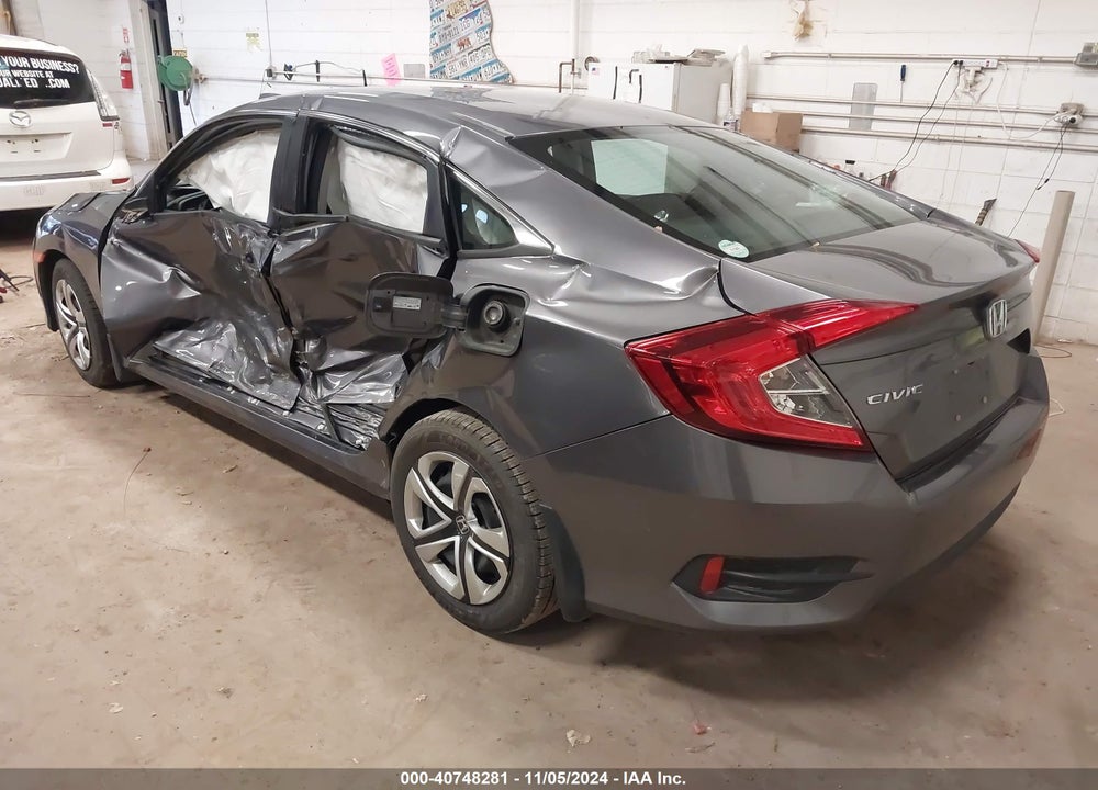 2017 HONDA CIVIC LX VIN: 19XFC2F52HE011407