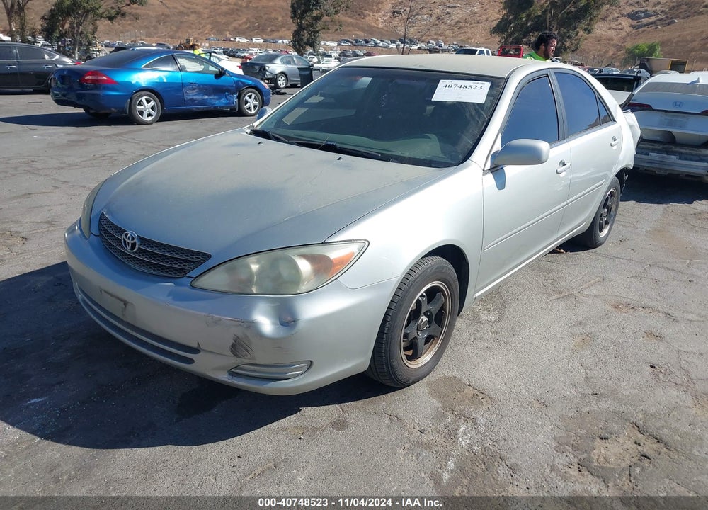 2002 TOYOTA CAMRY LE VIN: JTDBE32KX20002576
