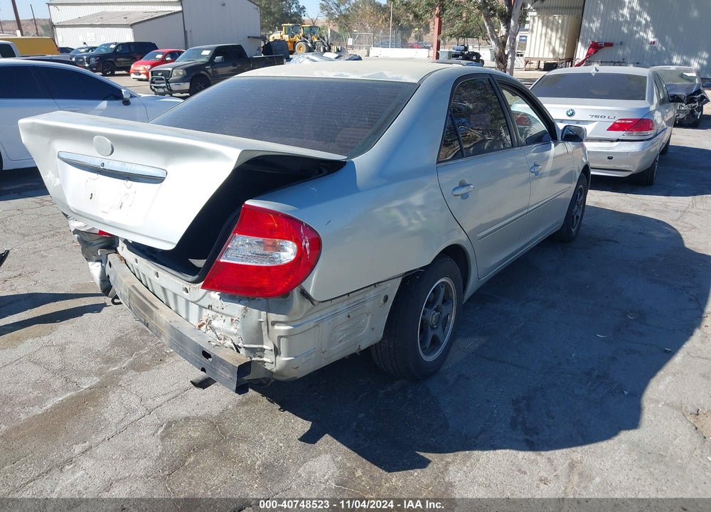 2002 TOYOTA CAMRY LE VIN: JTDBE32KX20002576