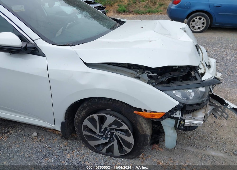 2018 HONDA CIVIC LX VIN: SHHFK7G21JU217028