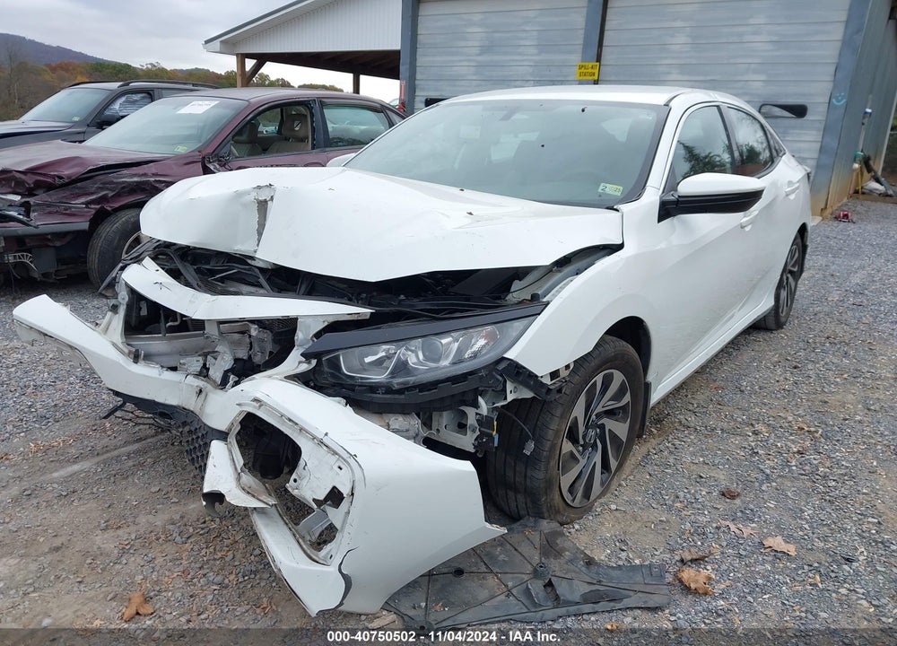2018 HONDA CIVIC LX VIN: SHHFK7G21JU217028