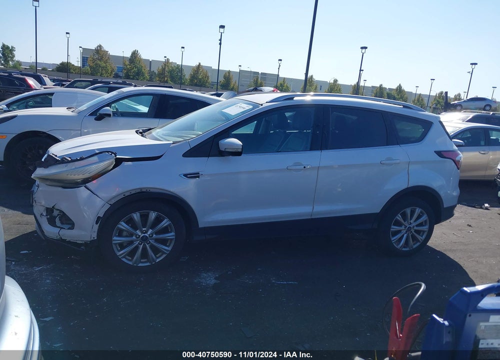2017 FORD ESCAPE TITANIUM VIN: 1FMCU0J94HUD42288