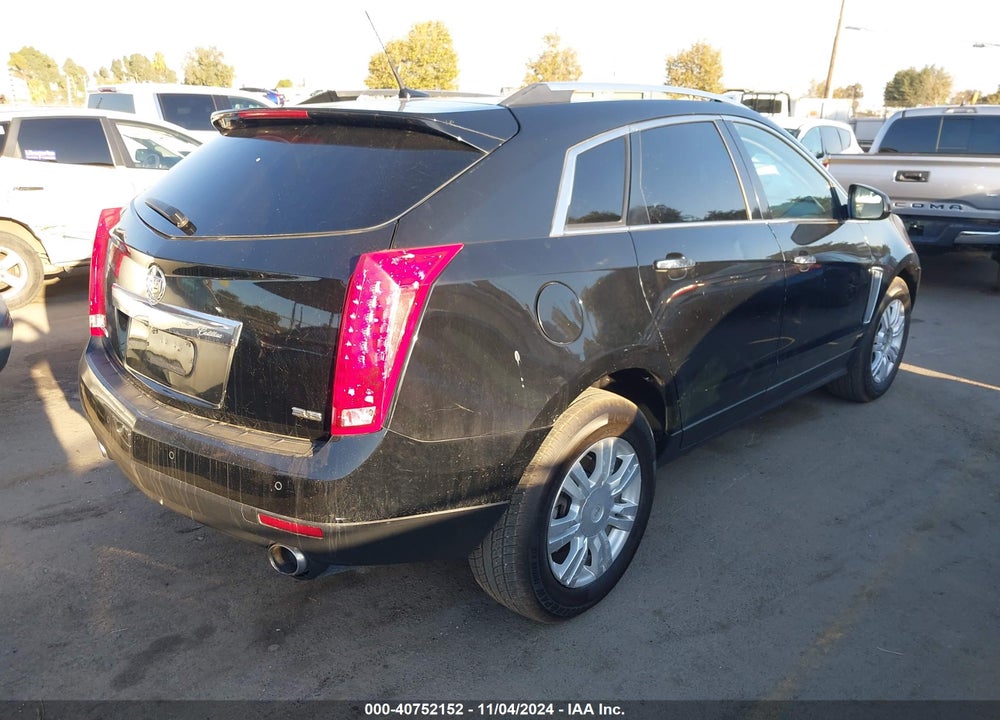 2014 CADILLAC SRX LUXURY COLLECTION VIN: 3GYFNBE39ES549734