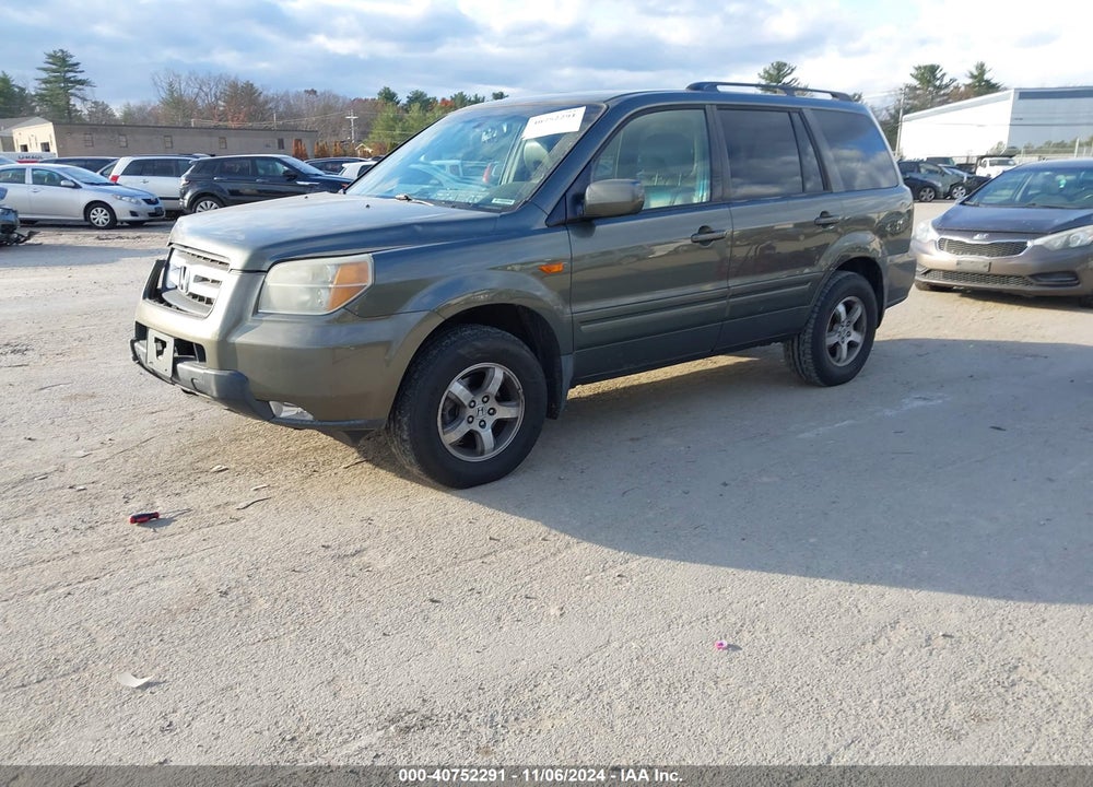 2006 HONDA PILOT EX-L VIN: 5FNYF18596B023021