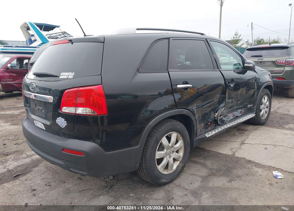 2012 KIA SORENTO LX VIN: 5XYKTCA65CG256945