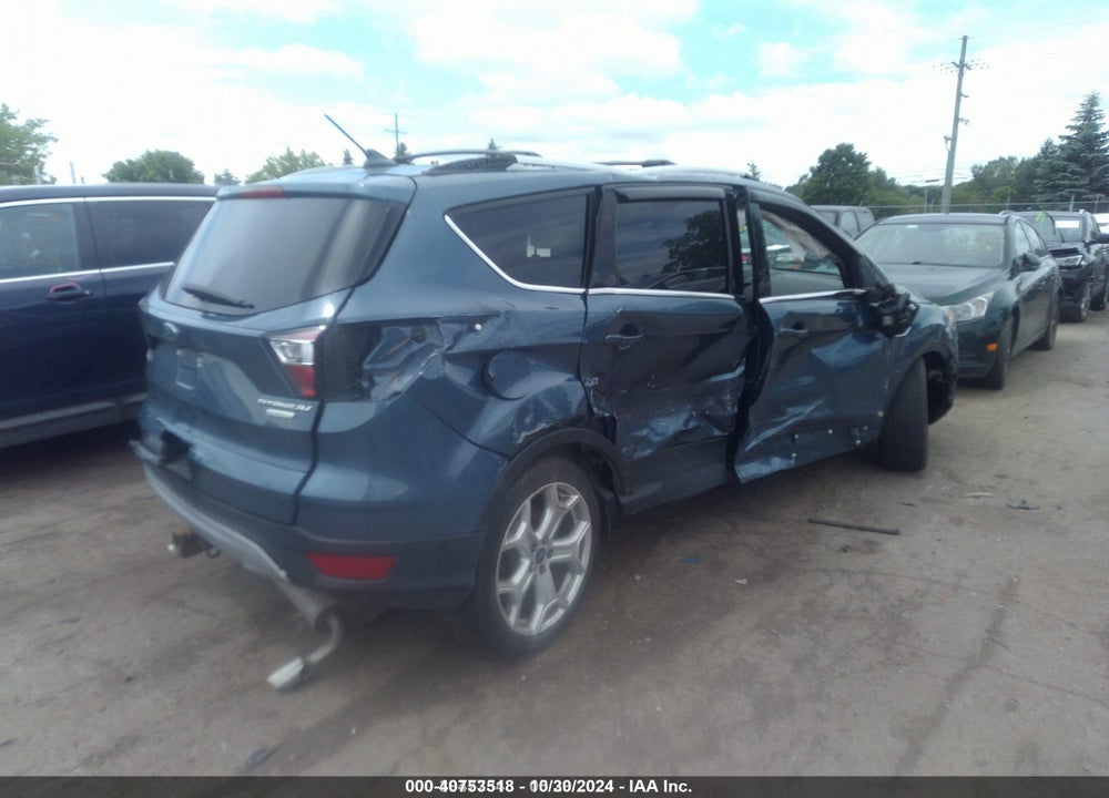 2018 FORD ESCAPE TITANIUM VIN: 1FMCU0J94JUA44409