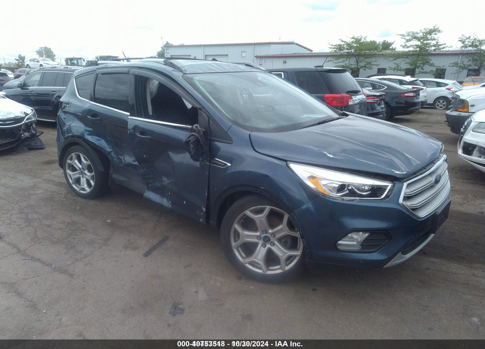 2018 FORD ESCAPE TITANIUM VIN: 1FMCU0J94JUA44409