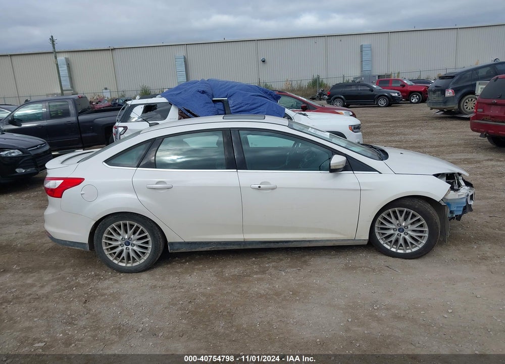 2014 FORD FOCUS TITANIUM VIN: 1FADP3J25EL128213