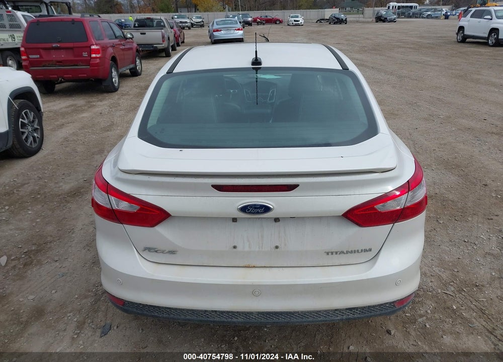 2014 FORD FOCUS TITANIUM VIN: 1FADP3J25EL128213
