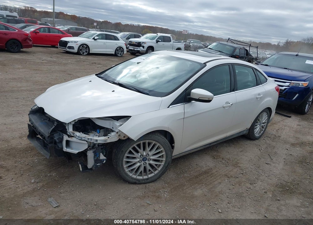 2014 FORD FOCUS TITANIUM VIN: 1FADP3J25EL128213