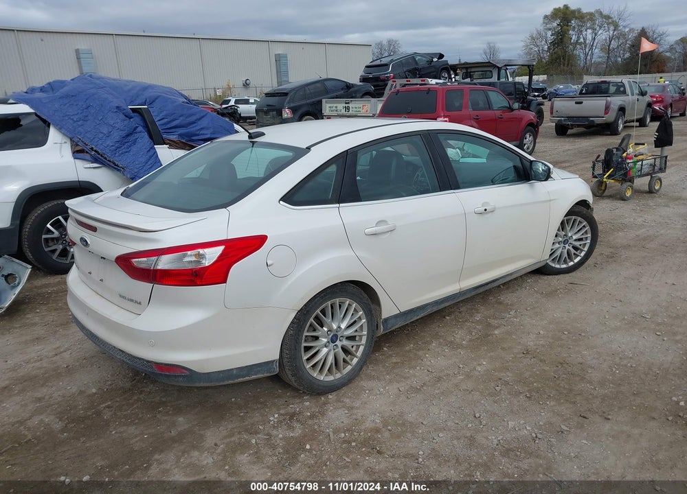 2014 FORD FOCUS TITANIUM VIN: 1FADP3J25EL128213
