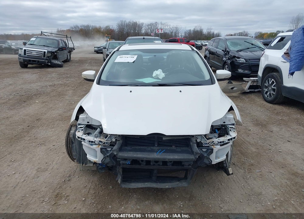 2014 FORD FOCUS TITANIUM VIN: 1FADP3J25EL128213