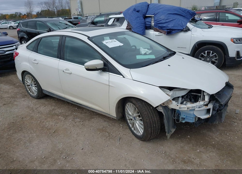 2014 FORD FOCUS TITANIUM VIN: 1FADP3J25EL128213
