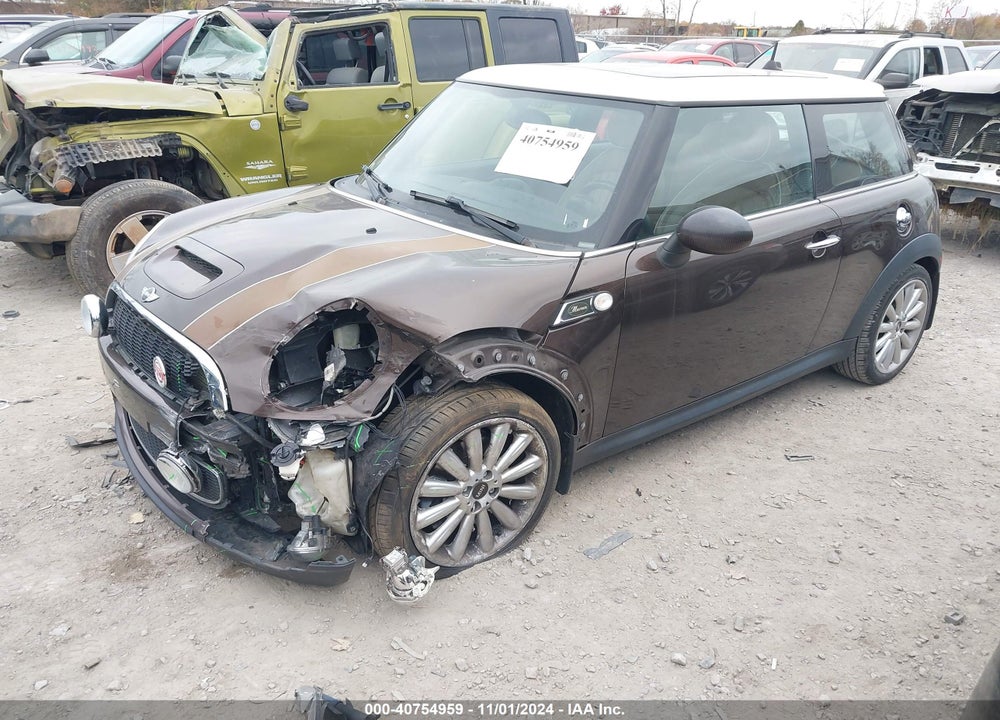 2010 MINI COOPER S VIN: WMWMF7C51ATZ69836