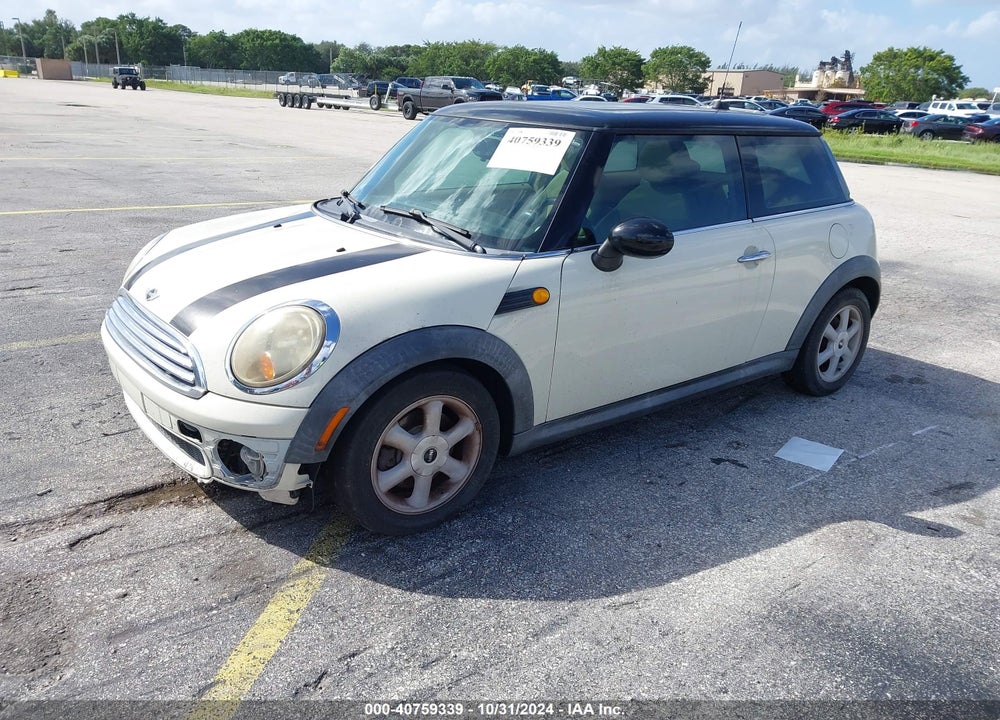 2010 MINI COOPER VIN: WMWMF3C56ATZ63586