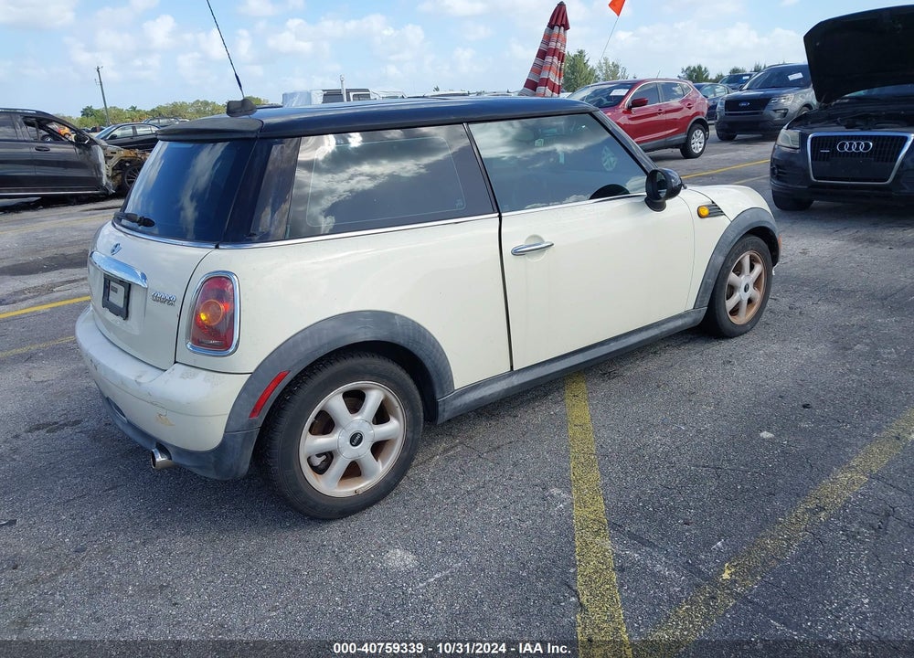 2010 MINI COOPER VIN: WMWMF3C56ATZ63586