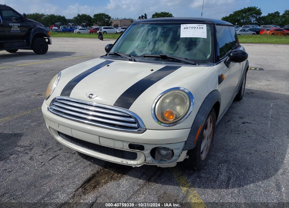 2010 MINI COOPER VIN: WMWMF3C56ATZ63586