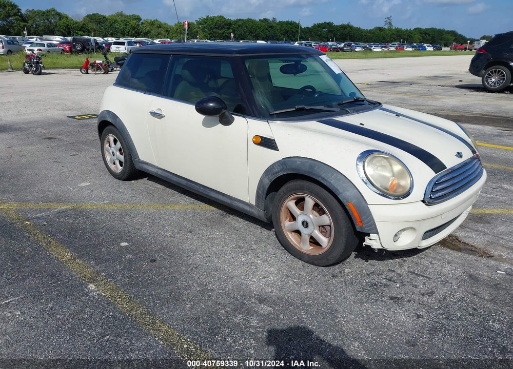 2010 MINI COOPER VIN: WMWMF3C56ATZ63586