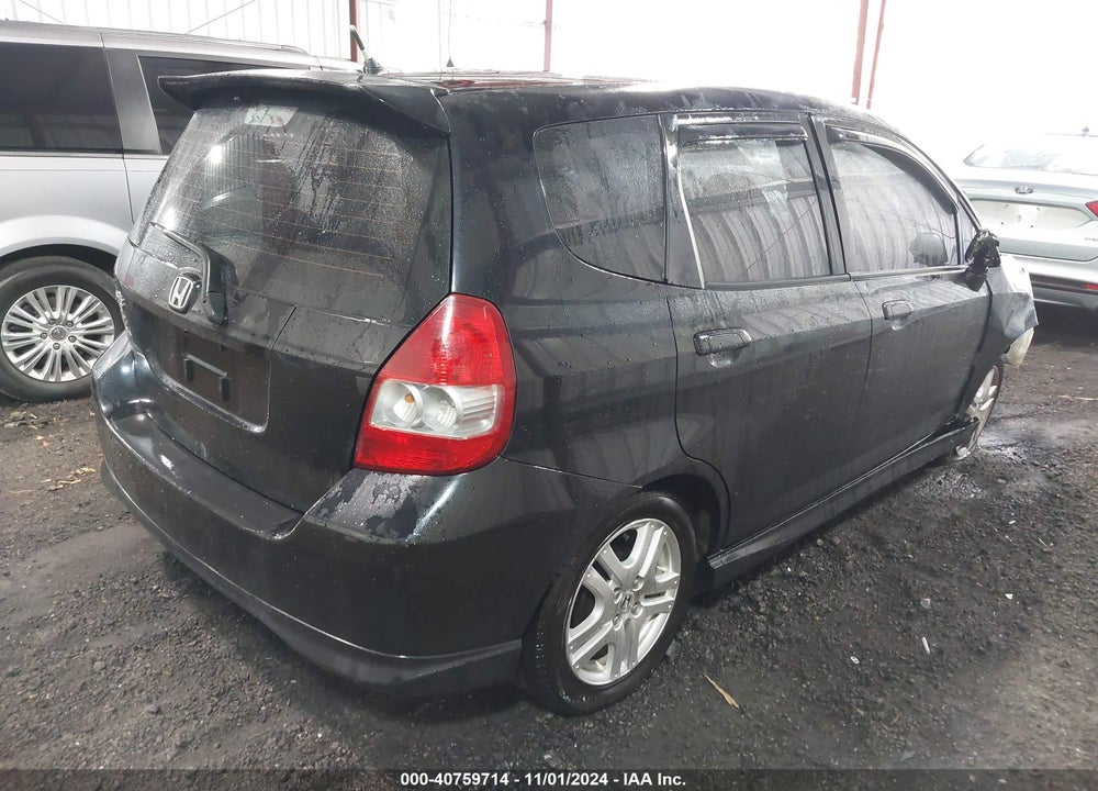 2007 HONDA FIT VIN: JHMGD38677S041932