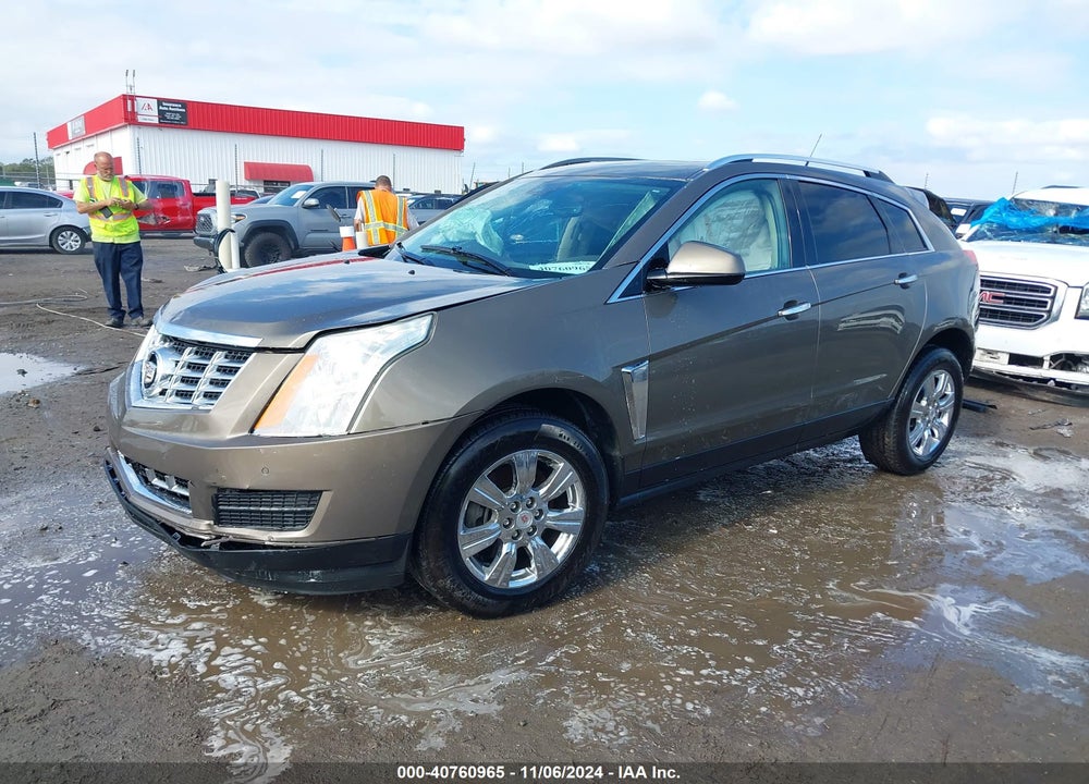 2014 CADILLAC SRX LUXURY COLLECTION VIN: 3GYFNBE31ES663422