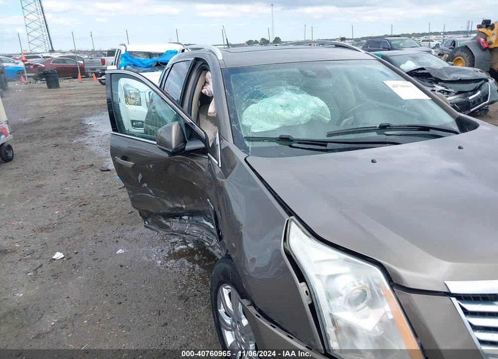 2014 CADILLAC SRX LUXURY COLLECTION VIN: 3GYFNBE31ES663422